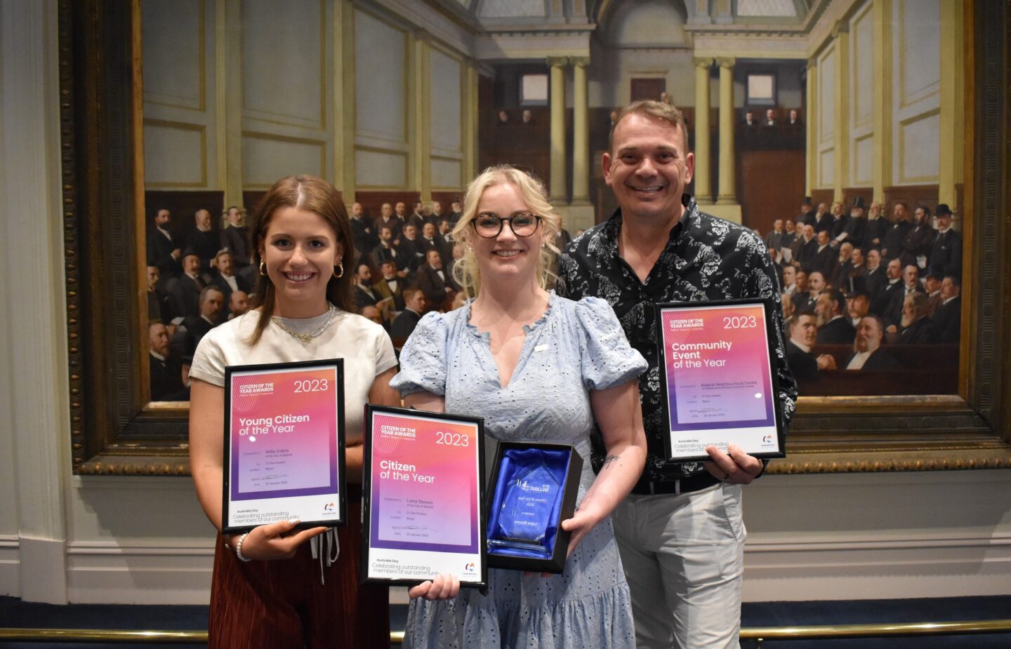 Award recipients holding their certificates at the community awards for 2023.